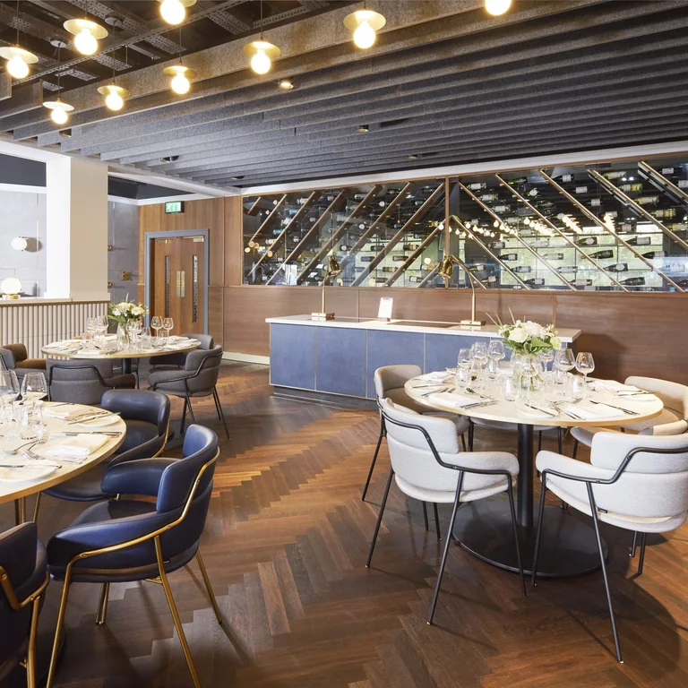 A restaurant dining room with contemporary furnishings.