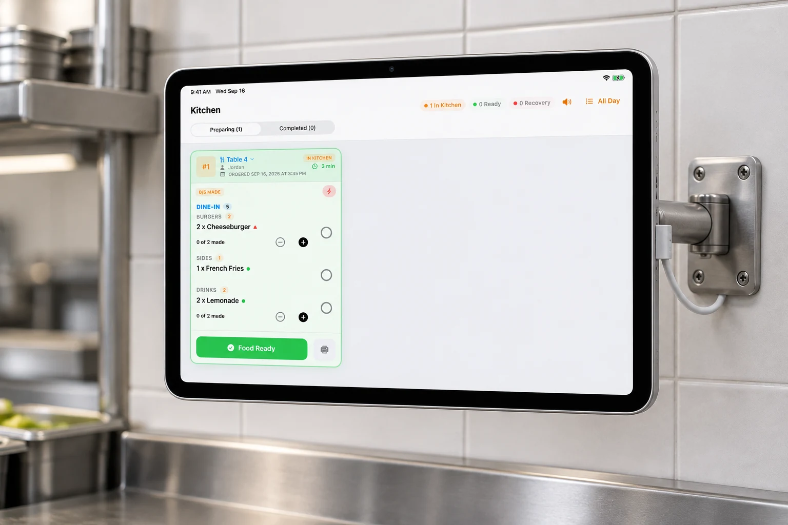 Taply kitchen display with American menu tickets on a mounted iPad