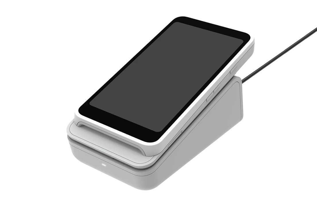 Stripe S710-compatible smart reader resting in an optional countertop dock